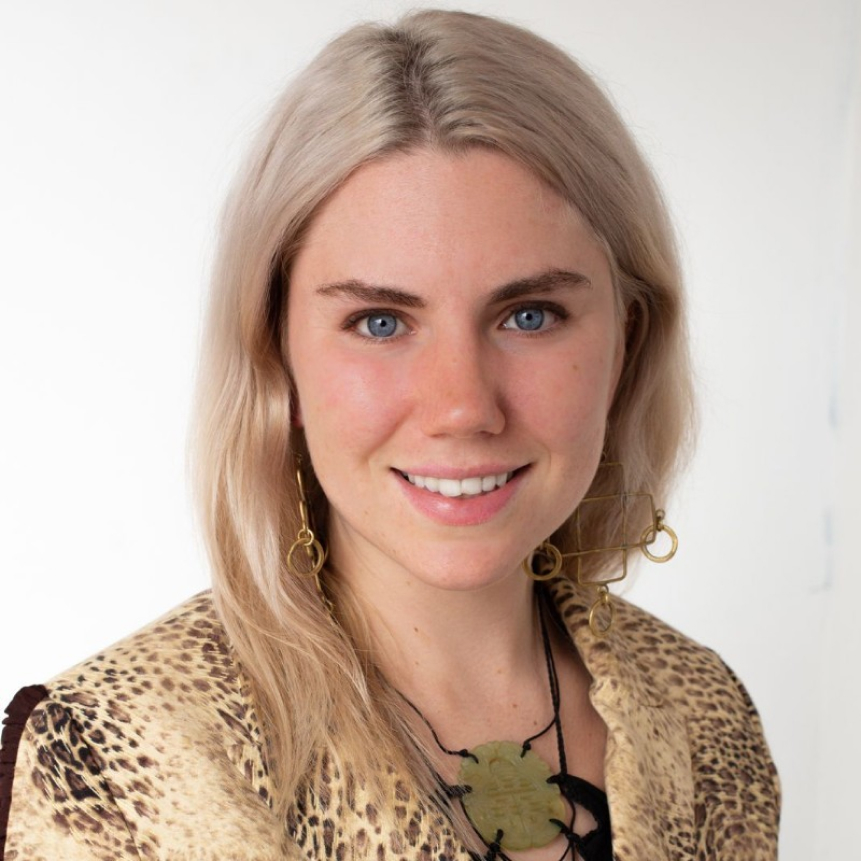 Photo of a blond woman with blue-green eyes and white background